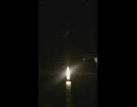 Candle fumes trail lights it up again with a lighter