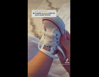 Mom shows tiny socks of her son