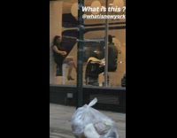 what is this white cylinder robot waiters in store