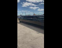 Black challenger car front but long as limousine