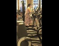 Woman dress romper gym elliptical heels blocks on feet