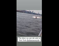 Joker costume ride jet skit on river