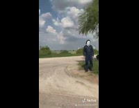 Michael Myers side of road day time 