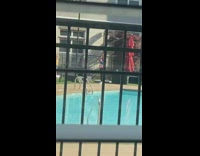 Girl white hat drink glass pool window commentary