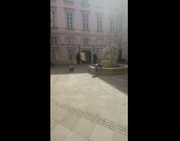 Woman bend backwards at the water fountain