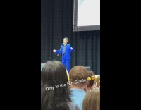 Fifth grader sings at talent show 