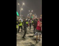 Men in Safety Vests Chants on Street