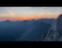 Submitter shows sunrise on top of mountain