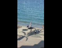 Girl bikini beach bald cameraman hut umbrella part 1