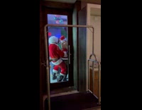 Two naughty Santa dry hump at bar