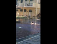 Collab IITW - Woman in bikini lie down in the swimming pool