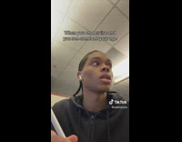 Collab BitchIG2 - Guy black hoodie earbuds looks around