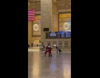 Man dancing in red white blue string outfit