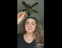 Girl stuffs jolly rancher candy in mouth 