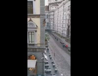 Blonde girl red dress wave skirt cathedral