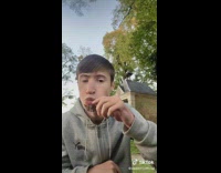 Guy bites into fruit shaped jelly