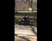 Fedex worker kisses girl on park bench 