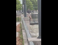 Woman in cow print shorts twerks at the dock