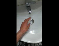 Guy dissolve toilet paper tube with water