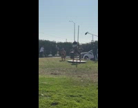 Girl white crop top spin pole dance