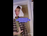 Guy steals taco bell drive thru sign 