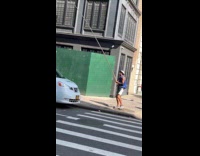 Driver spare change man with long stick