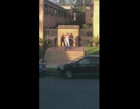 Three women dance front gate tiktok video sunset