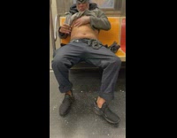 Man Shaves Belly with Scissors in Train