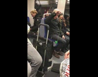 Guy plays with yoyo on train