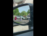 Girl red pants kneel pose side mirror