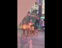 Friends wearing bear onesie having photoshoot