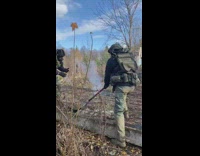 Guy hit airsoft grenades with hockey stick