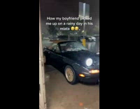 Guy drives car up for girl to avoid rain 