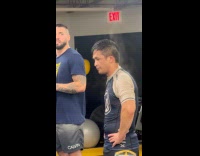 Man at gym has steaming coming off from body