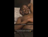 Little boy in bed three phones face time ear buds