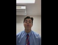 Man in Polo Sings While Play Piano