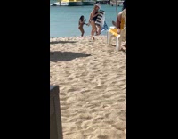 Curly woman pastel bikini beach umbrella boat