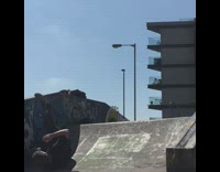 Guy skateboard up half pipe hits stomach on top of ramp