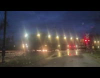 Train rail grinds on railroad sparks nighttime