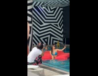 Collab IITW - Woman in blue bikini selfie while another woman takes her picture