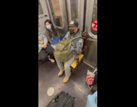Guy sitting on master dining chair on subway train