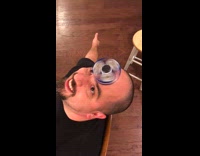 Man spin eyes really fast fidget spinner on forehead