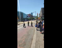 Police blocking intersection because of manhole explosion