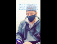 Guy pulls face mask down teases coronavirus 