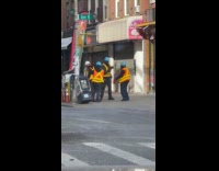 MTA vibing workers dance on the sidewalk