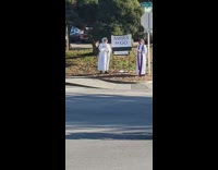 Women ashes to go booth on street