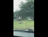 Man lie down rap sing music video shoot grass