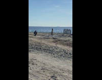 Woman beach dress signage chair windy pictorial part 2