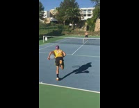 guy lakers jersey hit tennis ball misses shirtless guy