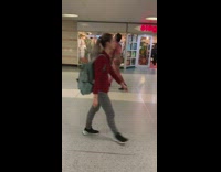 guy wearing pink outfit subway station